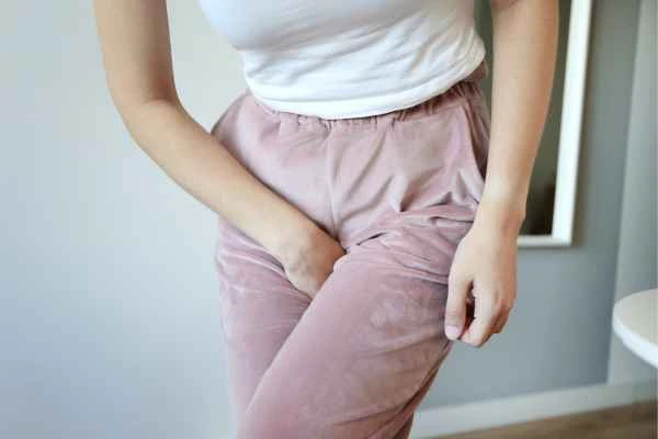 woman running for the toilet because of urinary incontinence Waltham Abbey